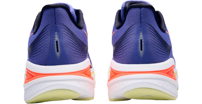 Blue running shoes with white and orange sole on a white background