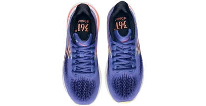 Pair of blue running shoes with visible branding on a white background