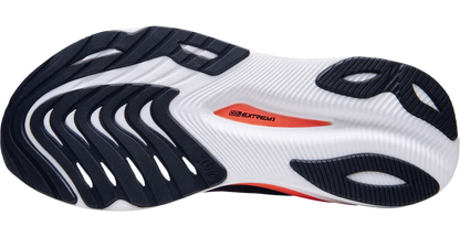Sole of a running shoe with black and white design on a white background