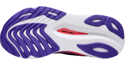 White running shoe with purple sole on a white background