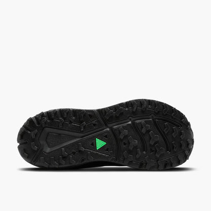 Black shoe sole with a green triangle logo on a white background