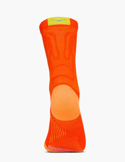 Orange sock with a yellow patch on a white background