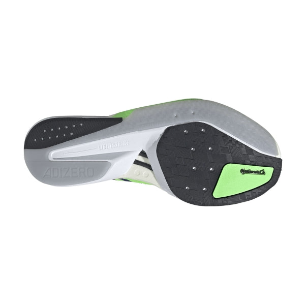 Close-up of a running shoe sole with brand logos on a white background