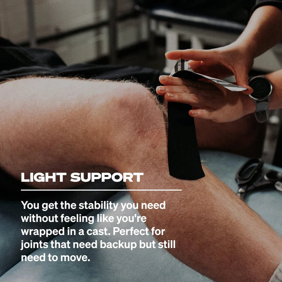 Person applying tape to a knee with text about light support