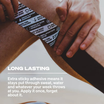 Person applying sports tape to their knee with text highlighting its long-lasting properties.