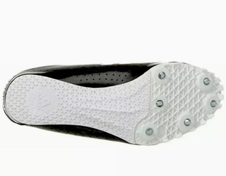 Close-up of a shoe sole with cleats on a white background