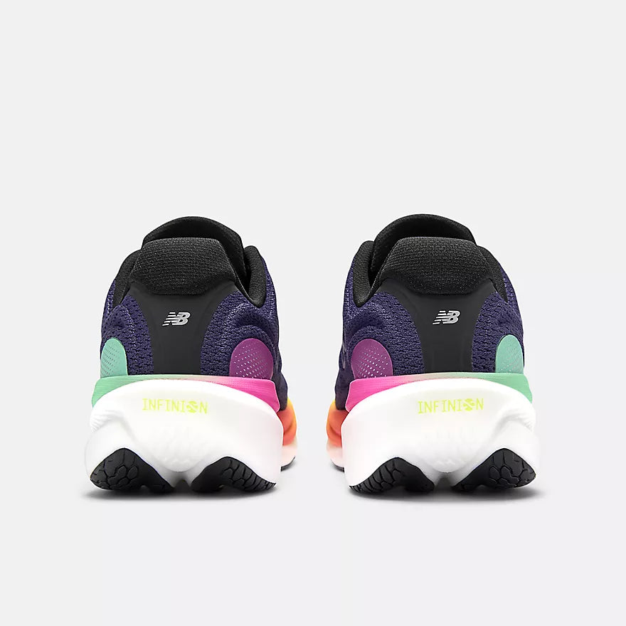 Pair of black and purple New Balance Women's 1080 v15 running shoes with colorful soles on a white background