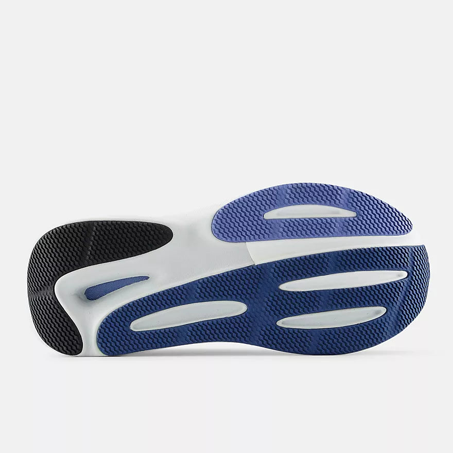 Close-up of a New Balance Women's 860 v15 Wide shoe sole with blue and white design on a light gray background