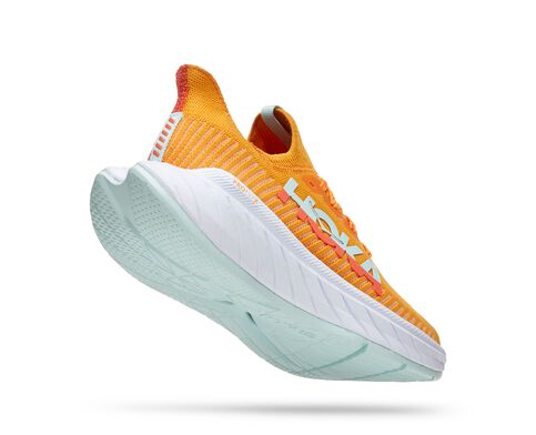 Hoka super Carbon X 3 road shoe for 2022 Orange fabic with white base.