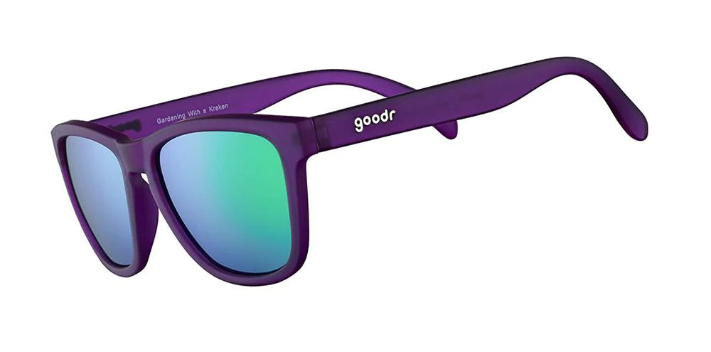 Goodr sunglasses purple frame with green blue reflective lens