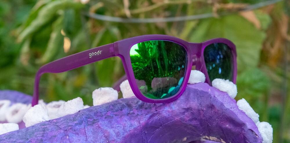 Goodr sunglasses purple frame with green blue reflective lens