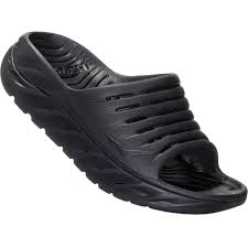 Black with black sole 'slide' style sandal.
