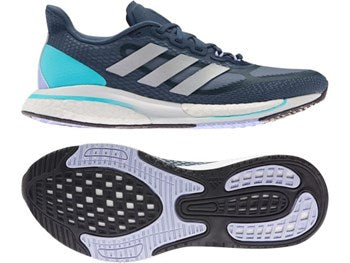 Navy blue and silver adidas running shoe for women.