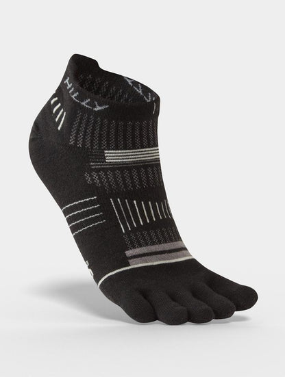 A pair of black Hilly Toe Socks designed for running, showing the foot and toe area with the sock slightly rolled down to reveal the ankle.