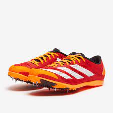 Cross country spikes shoes orange and red design with white logo stripes